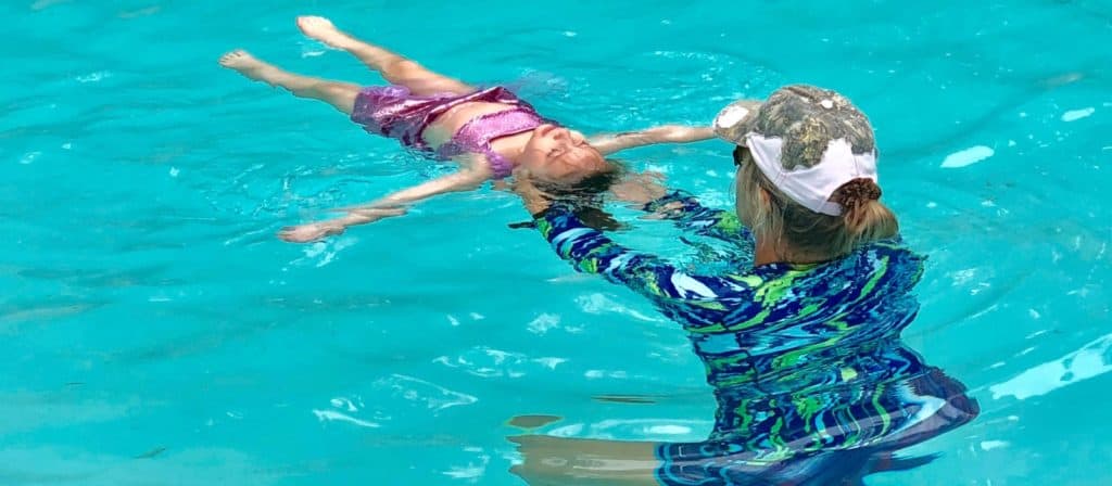 swimming instructor saving lives